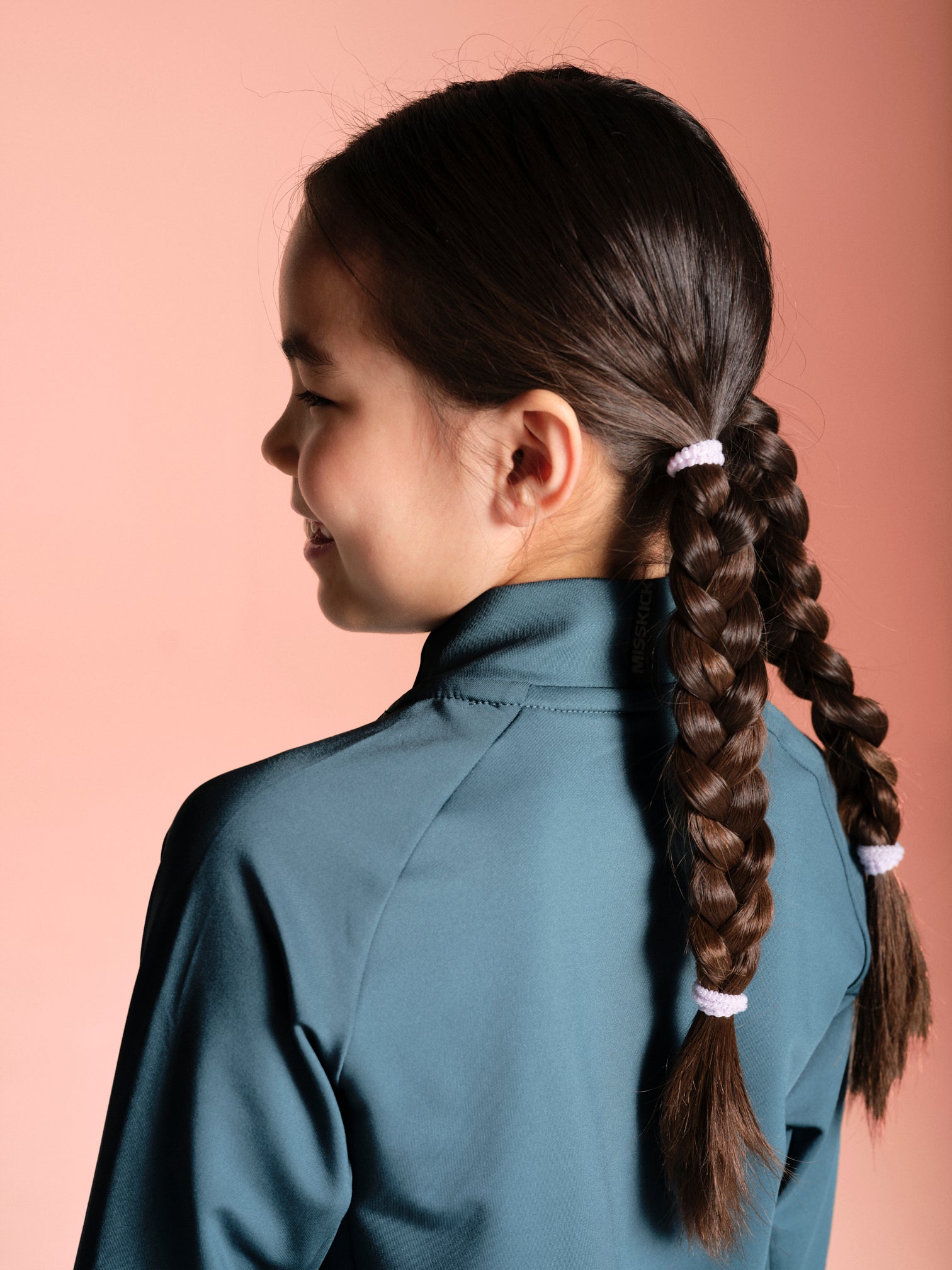 Poppy 1/4 zip girls training top teal back detail