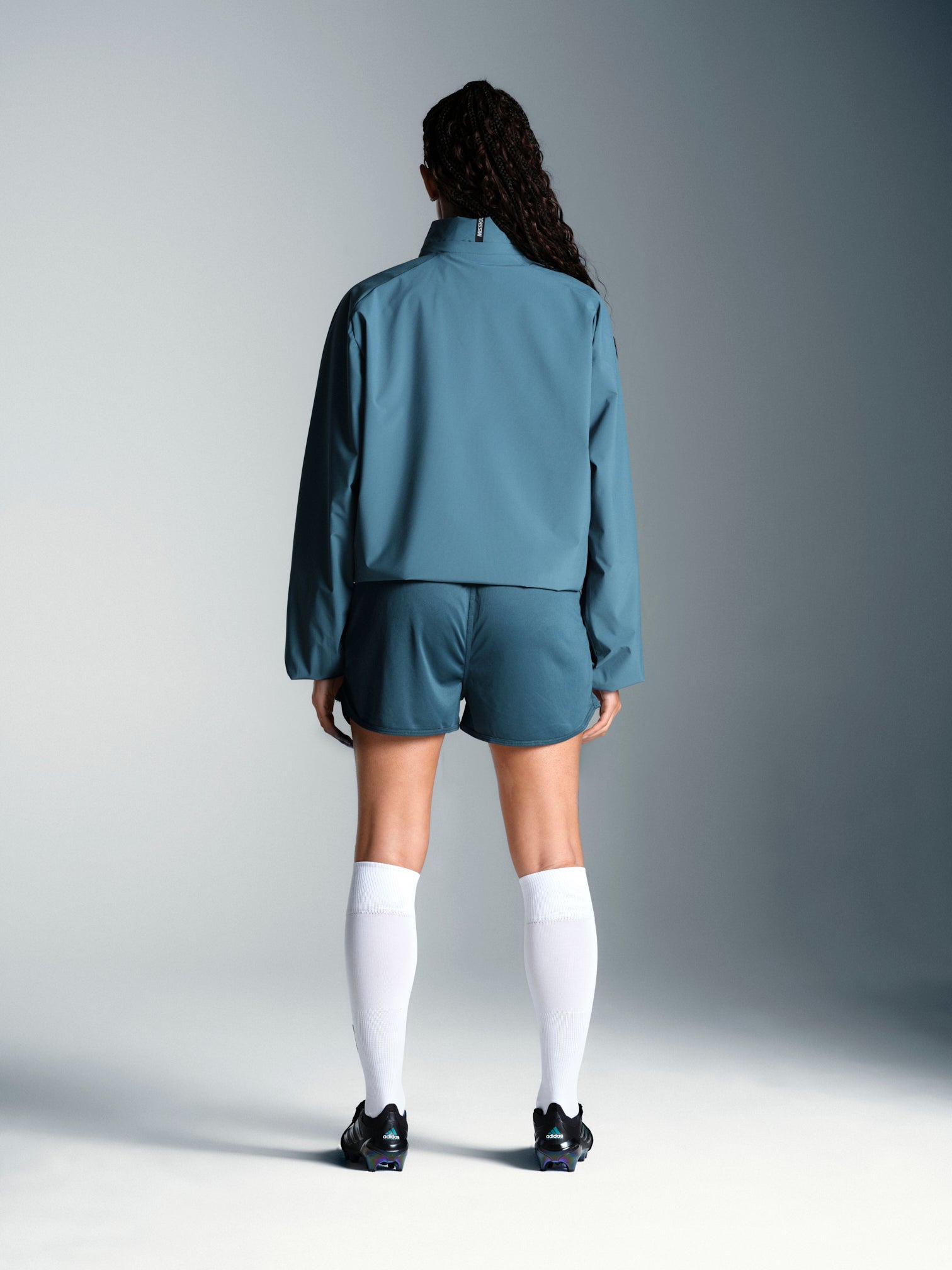 Misskick Tifoso wind breaker teal full body back