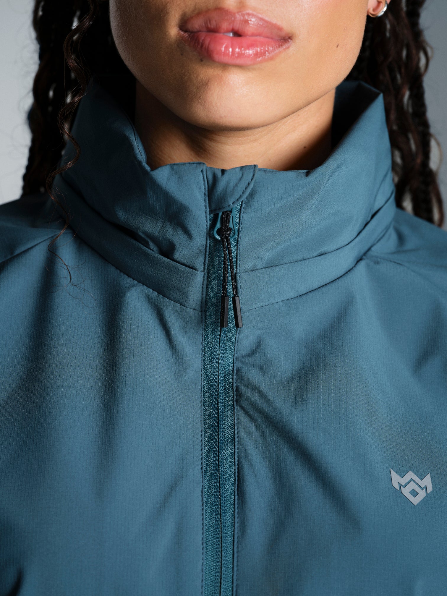 Misskick Tifoso wind breaker teal logo detail